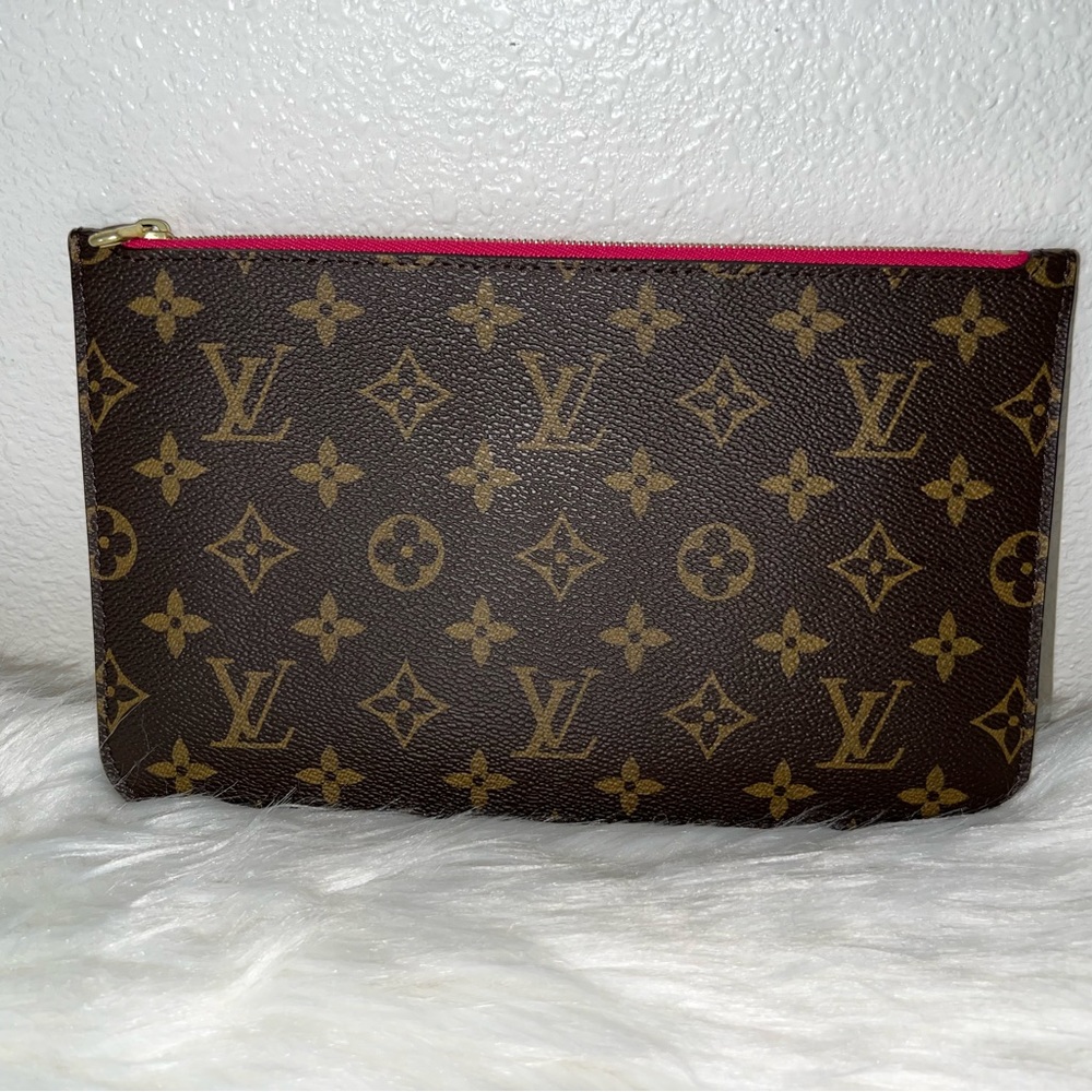 Authentic Louis Vuitton Pouch/wristlet in color Peony.